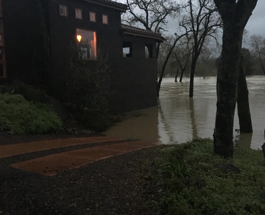 Image of the Estate House above floodwaters.